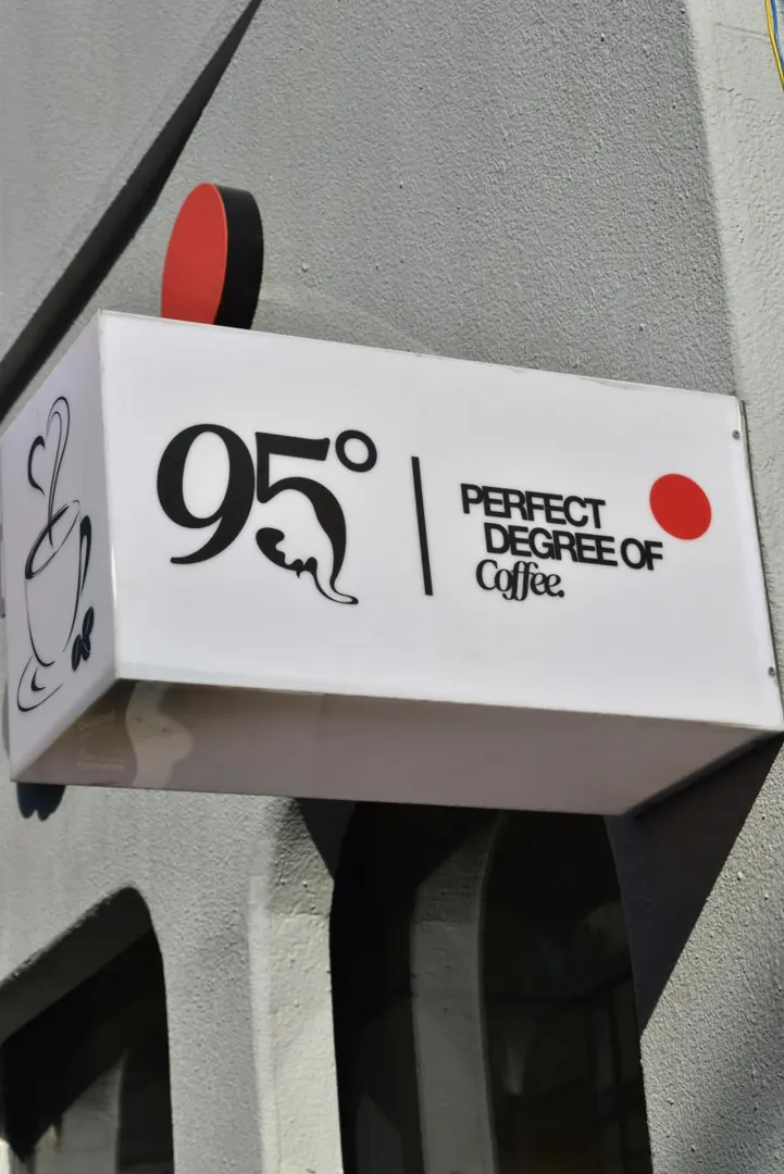 The 95° light box on the corner of the building