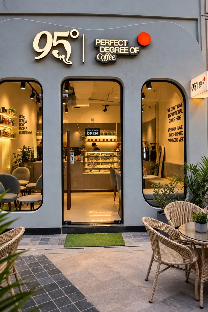 The 95 Degree storefront at dusk on M3M 65th Avenue